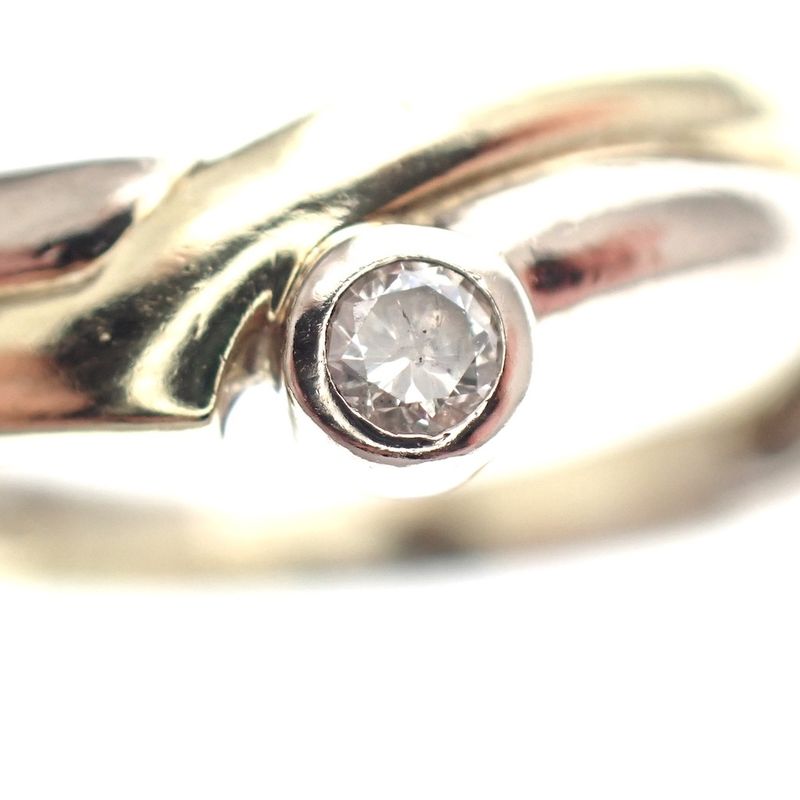 Image 4 of Two-tone gold fantasy ring set with 0.04 ct diamond.