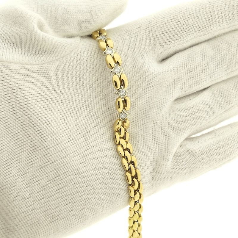Image 11 of Gold Bismarck link bracelet with 0.4 ct diamond.