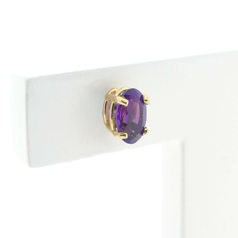 Image 4 of Gold stud earrings with synthetic purple gemstone
