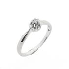 Image 1 of White gold solitaire ring with 0.03 ct diamond.