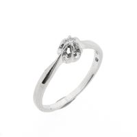 White gold solitaire ring with 0.03 ct diamond.