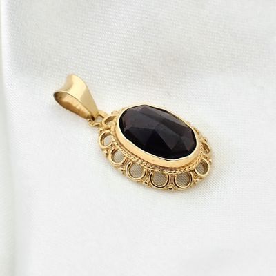 Vintage gold pendant with oval garnet Image 2 of Vintage gold pendant with oval garnet