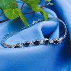 Image 10 of White gold cobra link bracelet with sapphire and diamond; 0.24 ct.