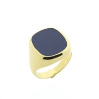 Gold signet ring with blue layered stone