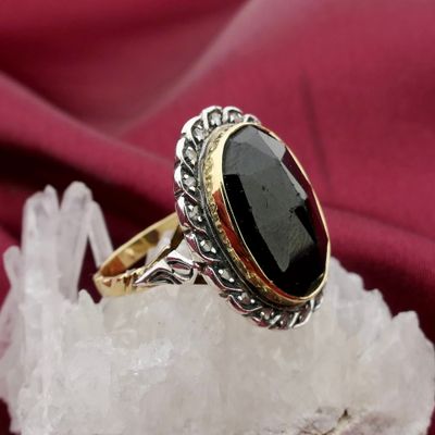 Image 2 of Gold and silver ring with garnet and diamonds; Approx. 0.20 ct.