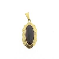 Vintage gold pendant with garnet
