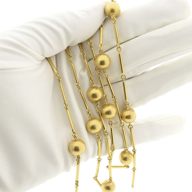 Image 9 of Gold long chain/saucer with beads