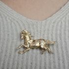 Image 9 of Golden brooch of a horse