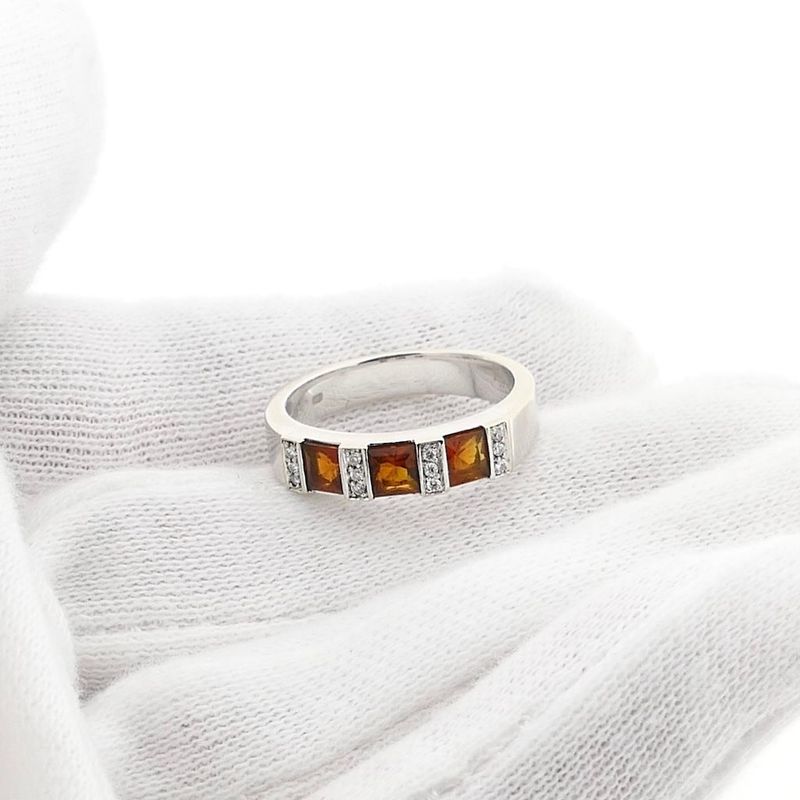 Image 7 of White gold ring with orange tourmaline and diamonds; 0.12 ct.