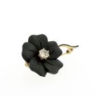 Image 3 of Gold flower brooch with onyx and diamond | 0.60 ct.