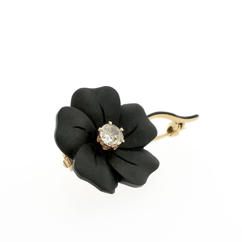 Image 3 of Gold flower brooch with onyx and diamond | 0.60 ct.