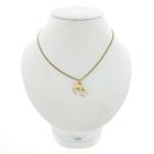 Image 3 of Gold pendant of a bird