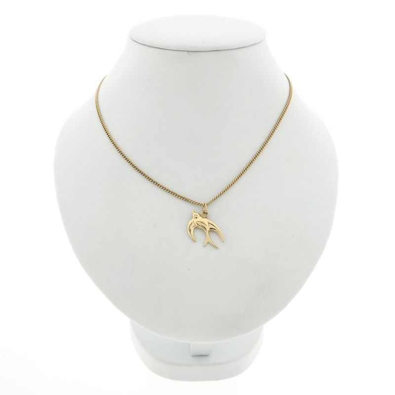 Image 3 of Gold pendant of a bird