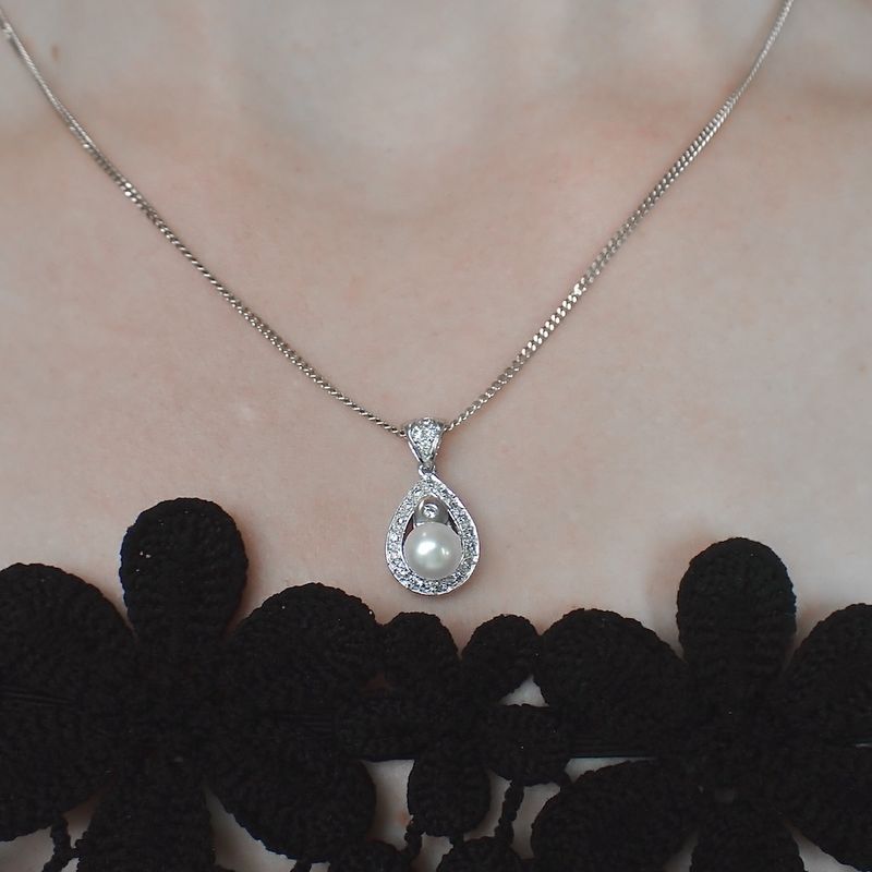 Image 3 of White gold pendant with pearl and diamonds; 0.13 ct.