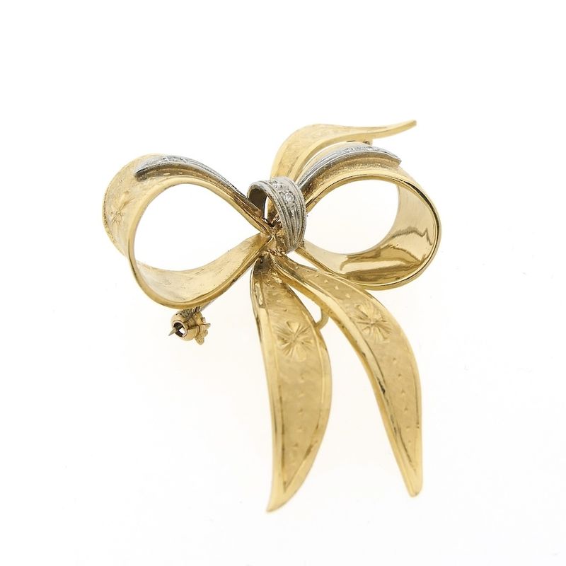 Image 4 of Gold brooch in the form of a bow with diamonds; 0.035 ct.
