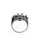 Image 3 of Silver ring with a wavy design.