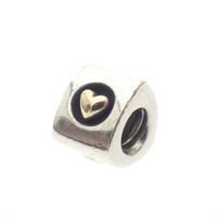 Pandora charm; Silver with gold; Heart of Gold