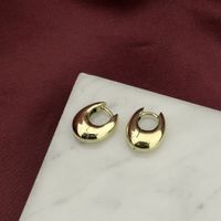 Gold oval earrings