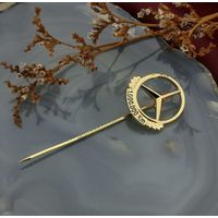 8 carat vintage lapel pin with Mercedes Benz logo