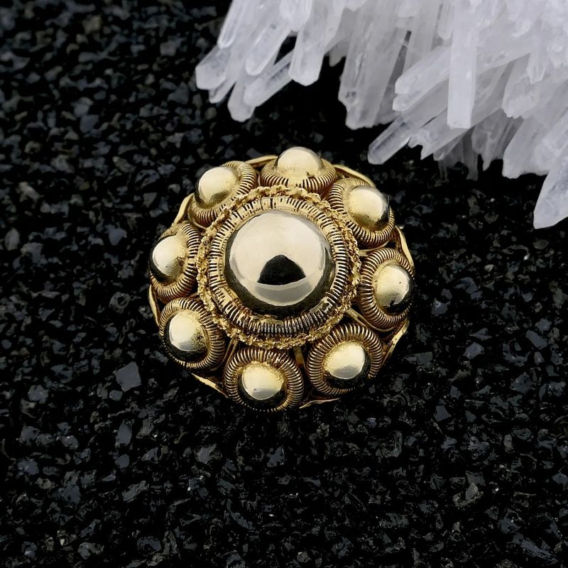 Image 2 of Vintage gold brooch with Zeeland buttons.