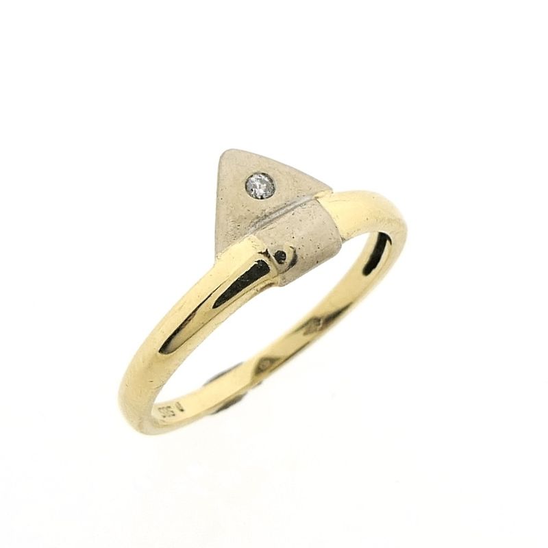 Image 1 of Two-tone gold solitaire ring with 0.015 ct diamond.