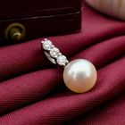 Image 2 of White gold pendant with pearl and diamonds; 0.21 ct.