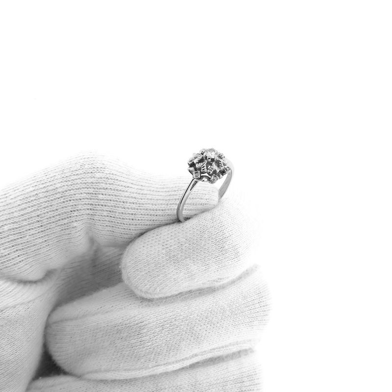 Image 10 of Antique white gold entourage ring with 0.10 ct diamond.