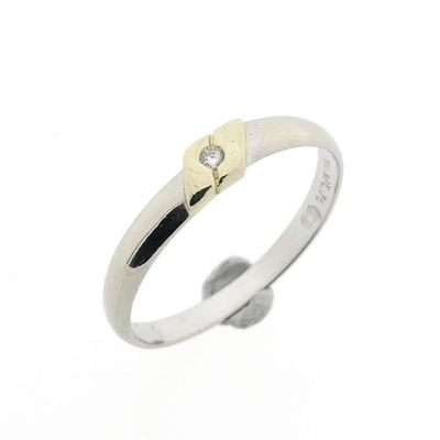 Image 1 of 18-karat bicolor solitaire ring with 0.01 ct. diamond
