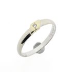 Image 1 of 18-karat bicolor solitaire ring with 0.01 ct. diamond