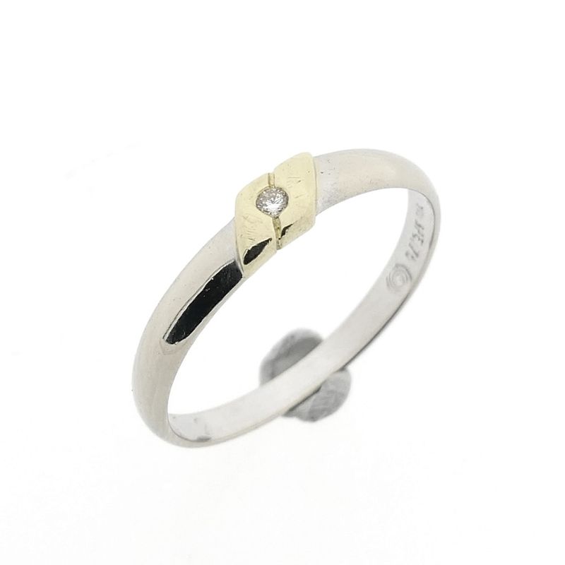 Image 1 of 18-karat bicolor solitaire ring with 0.01 ct. diamond