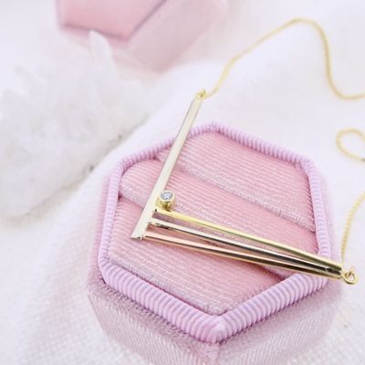 Gold necklace with a fixed tricolor pendant and zirconia. Image 2 of Gold necklace with a fixed tricolor pendant and zirconia.