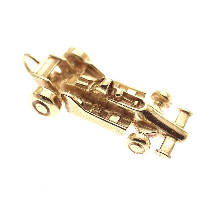 Image 4 of Gold pendant of a racing car