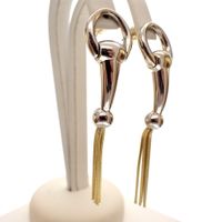 Bicolor gold stud earrings; Cetas