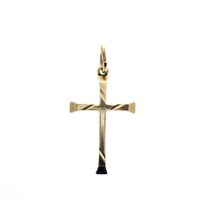 Gold pendant of a cross