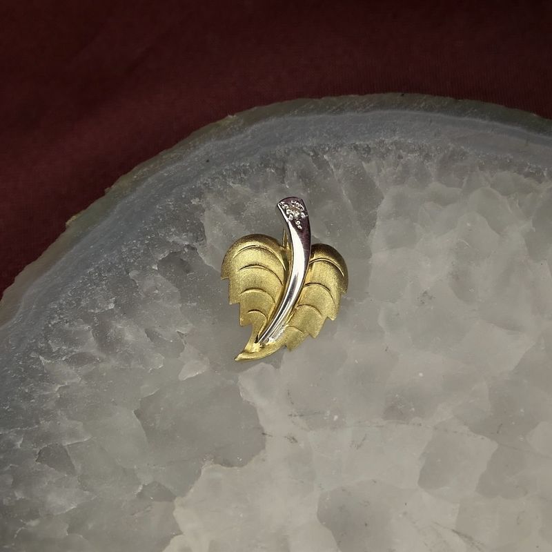 Image 2 of Two-tone gold pendant of a leaf with diamond | 0.02 ct.
