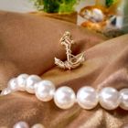 Image 2 of Gold pendant of an anchor