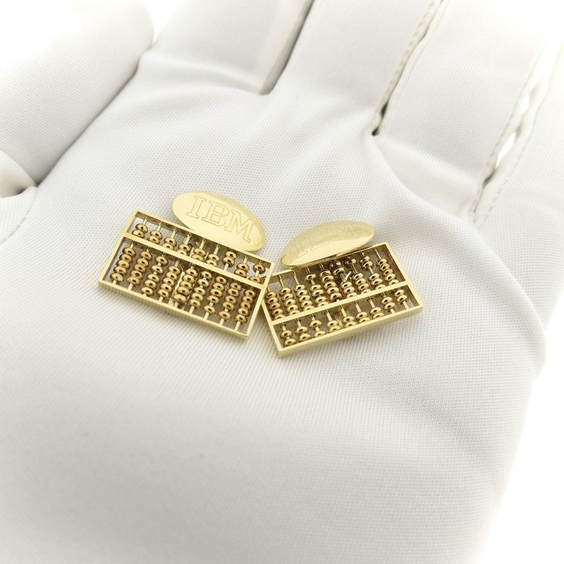 Image 13 of Gold cufflinks as an abacus.