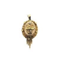 Antique gold pendant of a hat bell