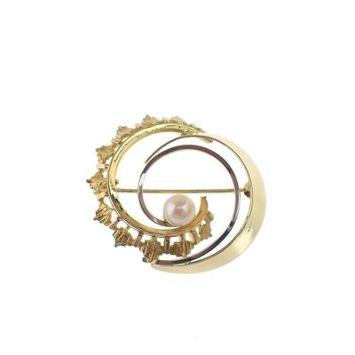 Image 1 of Two-tone gold brooch with pearl