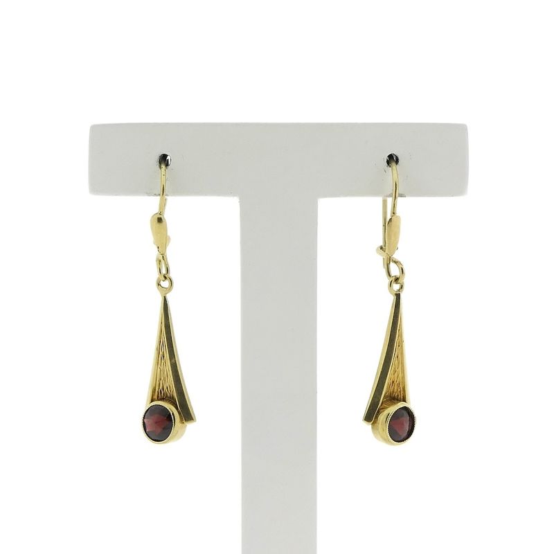 Image 1 of Vintage gold earrings with dark red stone