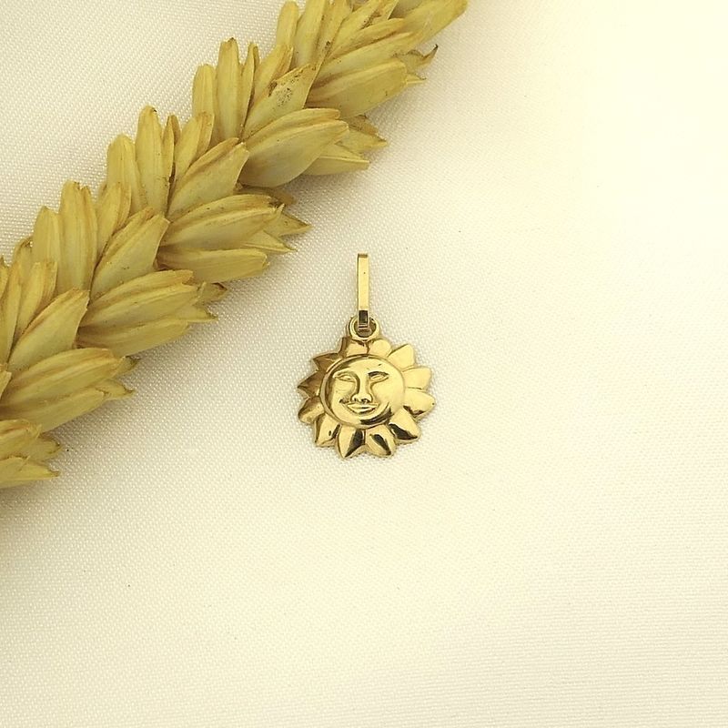 Image 2 of Golden pendant of a sun