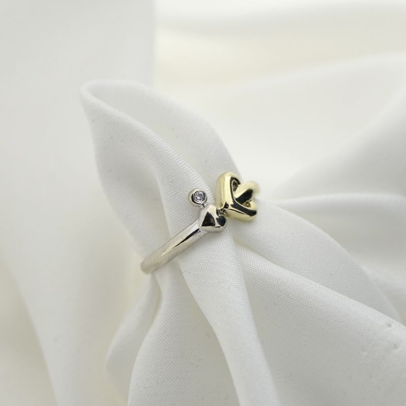 Image 4 of Two-tone gold solitaire ring with diamond; 0.005 ct.