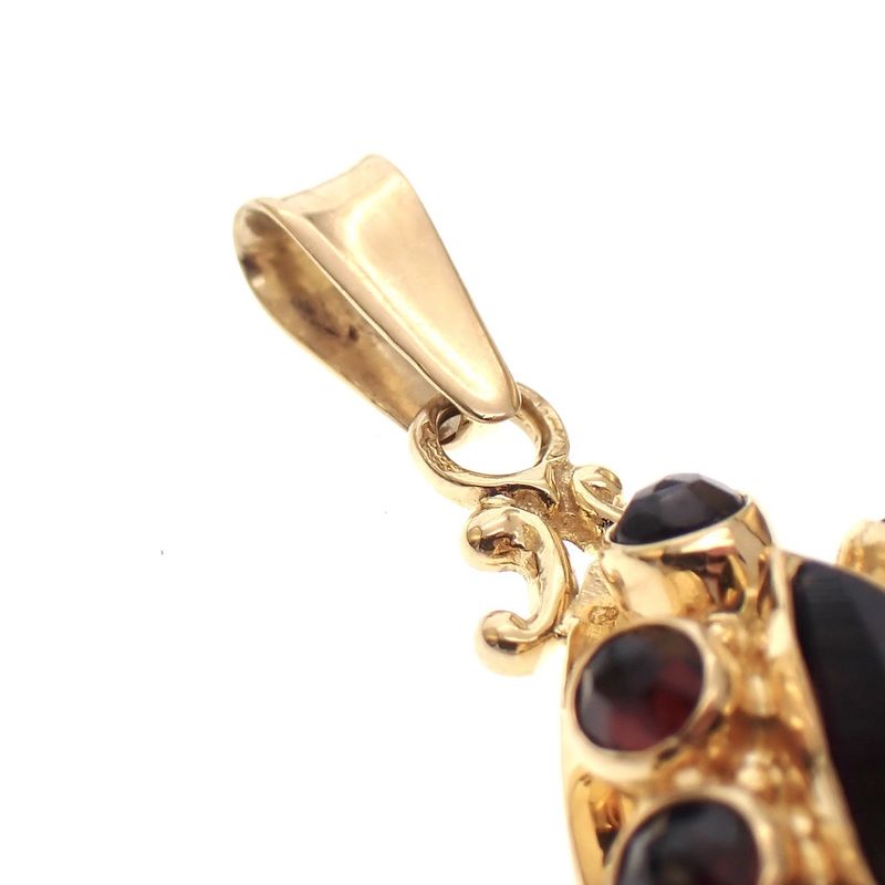 Image 4 of Vintage gold entourage pendant with garnet stones