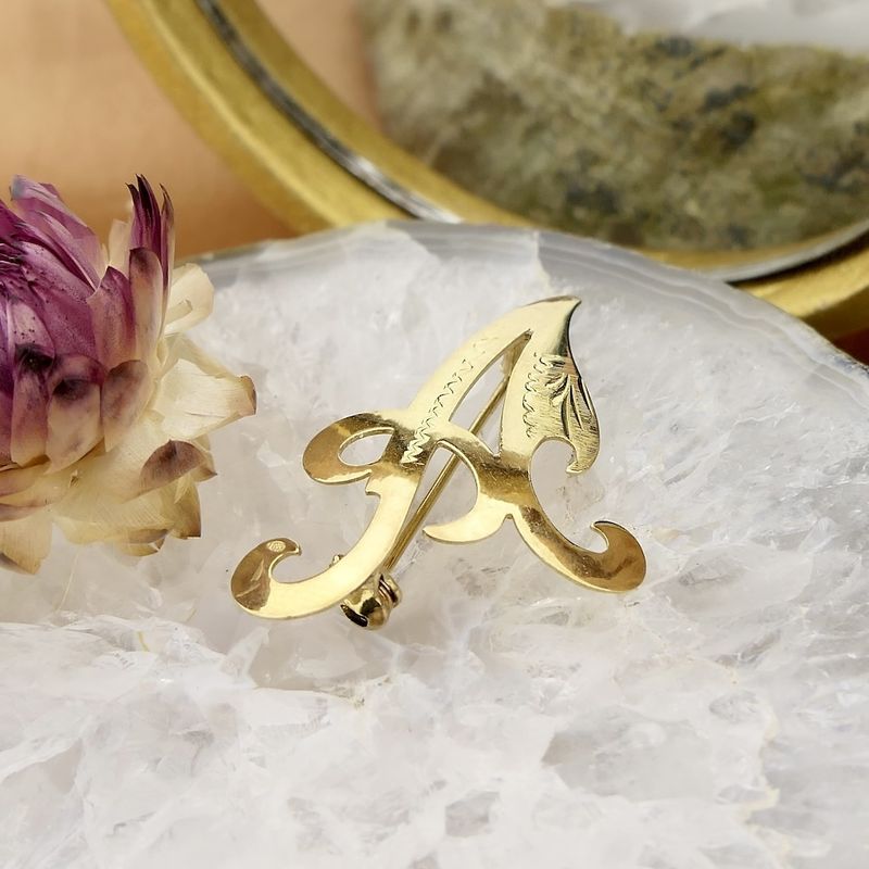 Image 2 of Gold letter brooch; letter A