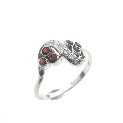 White gold ring with red stone and diamond | 0.12 ct. Image 1 of White gold ring with red stone and diamond | 0.12 ct.