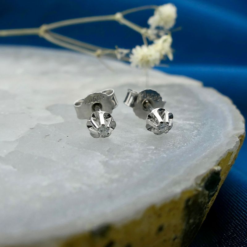 Image 2 of White gold solitaire stud earrings with diamond; 0.03 ct.