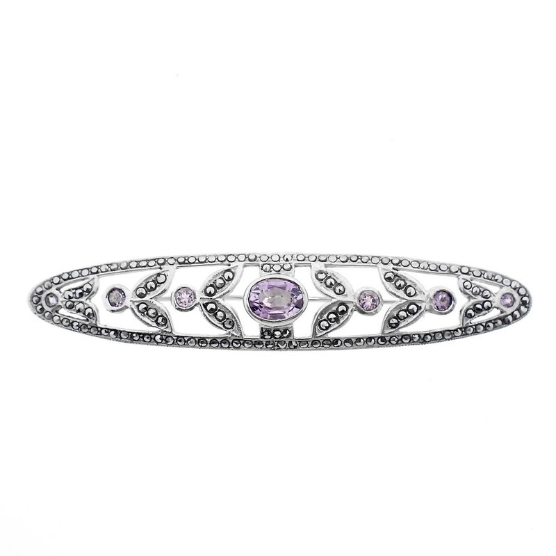 Image 1 of Silver brooch with purple zirconia stones