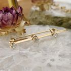 Image 2 of Rose gold brooch with diamond; 0.45 ct.