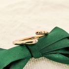 Image 2 of 18-karat two-tone gold solitaire ring with 0.025 ct. diamond