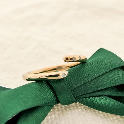 Image 2 of 18-karat two-tone gold solitaire ring with 0.025 ct. diamond